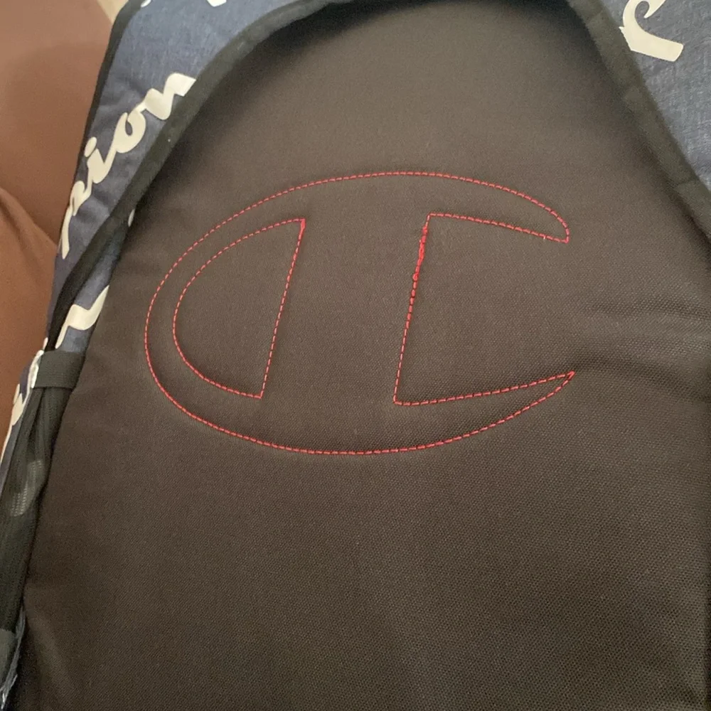 Champion blue,navy Travel Backpack,work bag, with Red Accents
